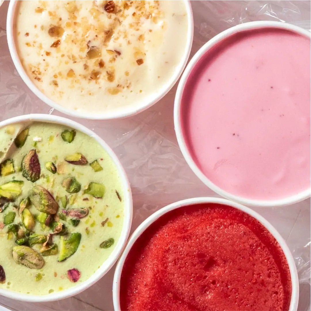 Minus Thirty flavour flat-lay showing the range together in a props-and-colour composition.
